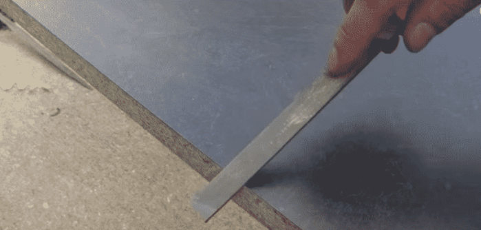 sanding and filing the laminated countertop
