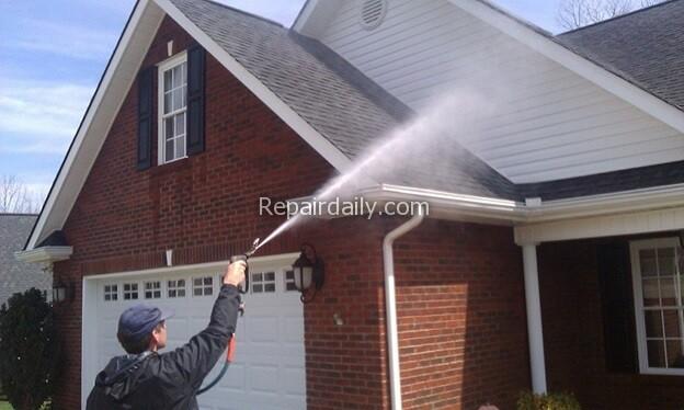 cleaning home with pressure washing