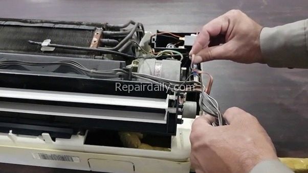 repairing air conditioner