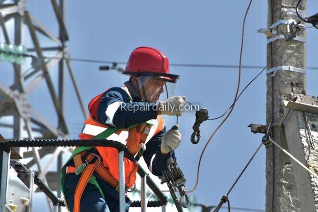 electrician at electricity energy pole
