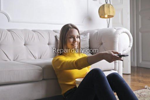 lady using remote
