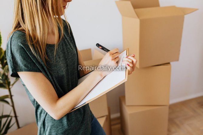 apartment moving lady boxes writing