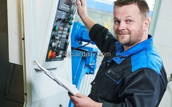 man with cnc router machine