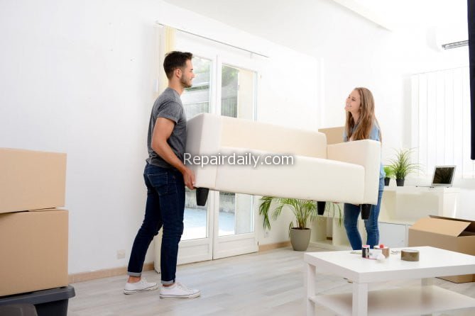 couple moving furniture