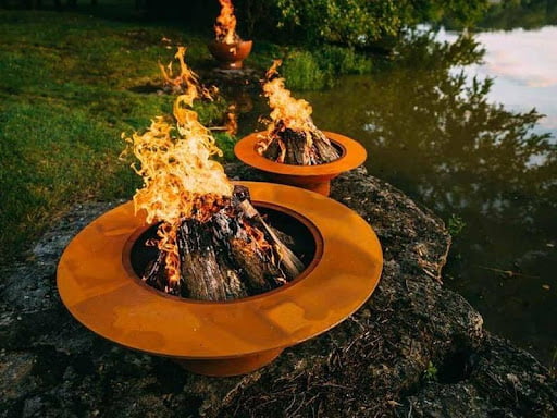 fire pit near pond